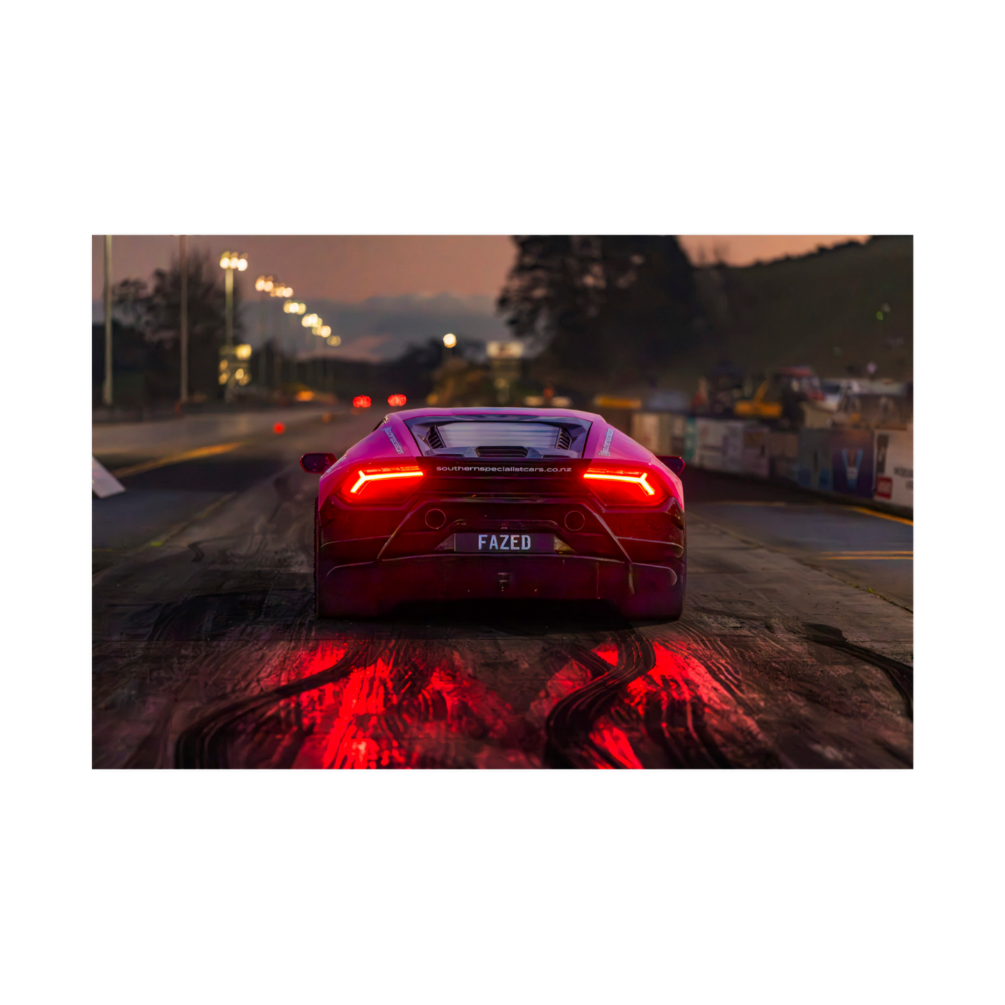 Rear view Lamborghini at dusk with glowing red taillights automotive wall art