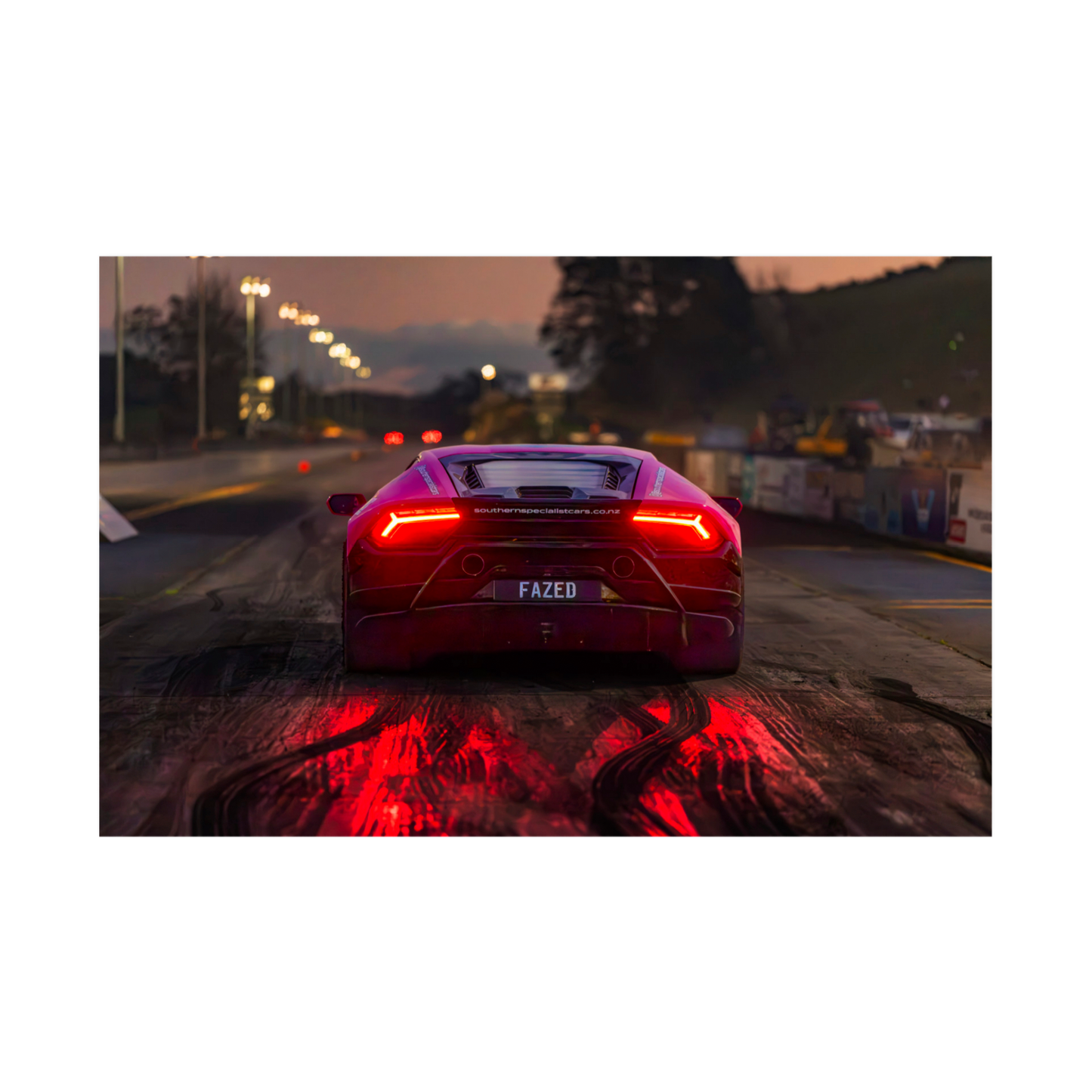 Rear view Lamborghini at dusk with glowing red taillights automotive wall art